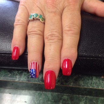 Hand-painted nail art with fine-line detail